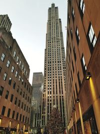 Low angle view of skyscrapers against sky