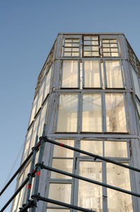 Low angle view of modern building against clear sky