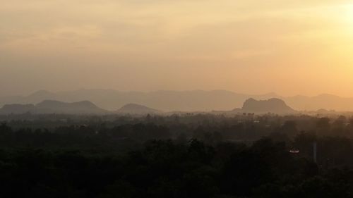 Scenic view of landscape against sky during sunset