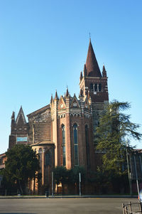 View of clock tower against blue sky