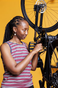 Side view of man riding bicycle