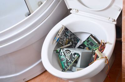 High angle view of garbage can on table