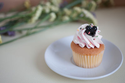 Close-up of cupcakes on table