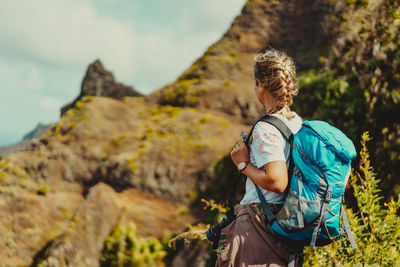 Rear view of woman looking at mountain