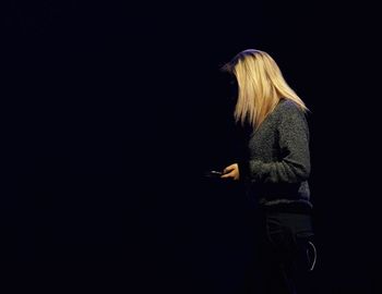 Full length of woman standing on floor