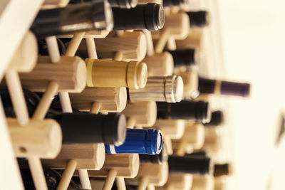 Close-up of wine bottles in rack