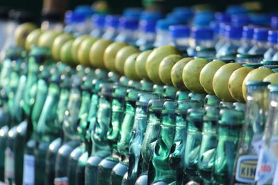 Close-up of green bottles