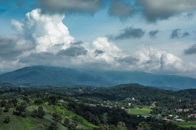 Aerial view of townscape against sky