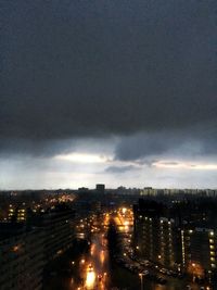 Illuminated cityscape at night