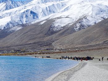 Group of people on snow covered land