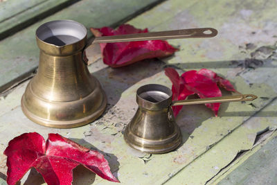 High angle view of old objects on table