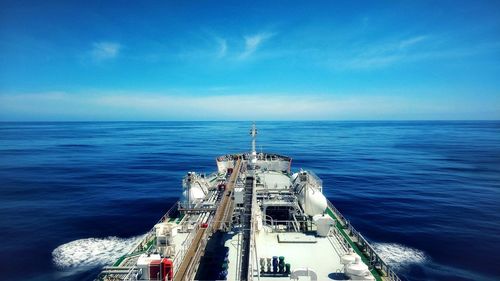 Scenic view of sea against blue sky