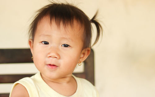 Portrait of cute boy at home
