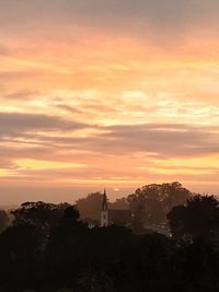 Scenic view of dramatic sky during sunset