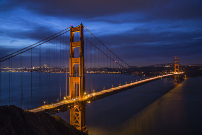 Illuminated golden gate bridge at night