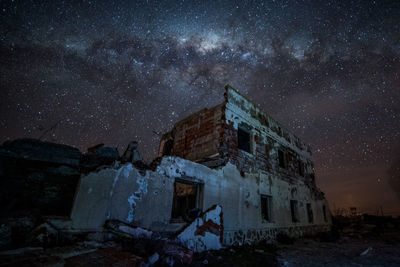 Old building against sky at night