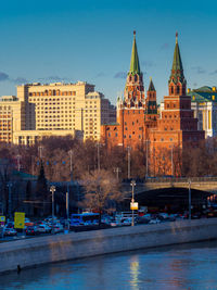 River against buildings in city