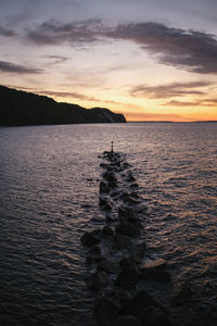 Scenic view of sea against sky during sunset