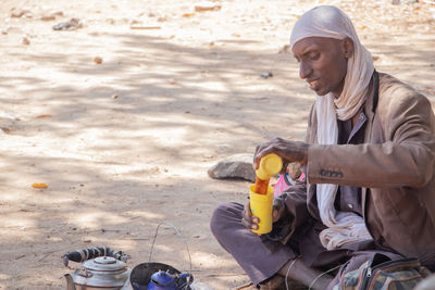 A fulani tribesman selling tea.