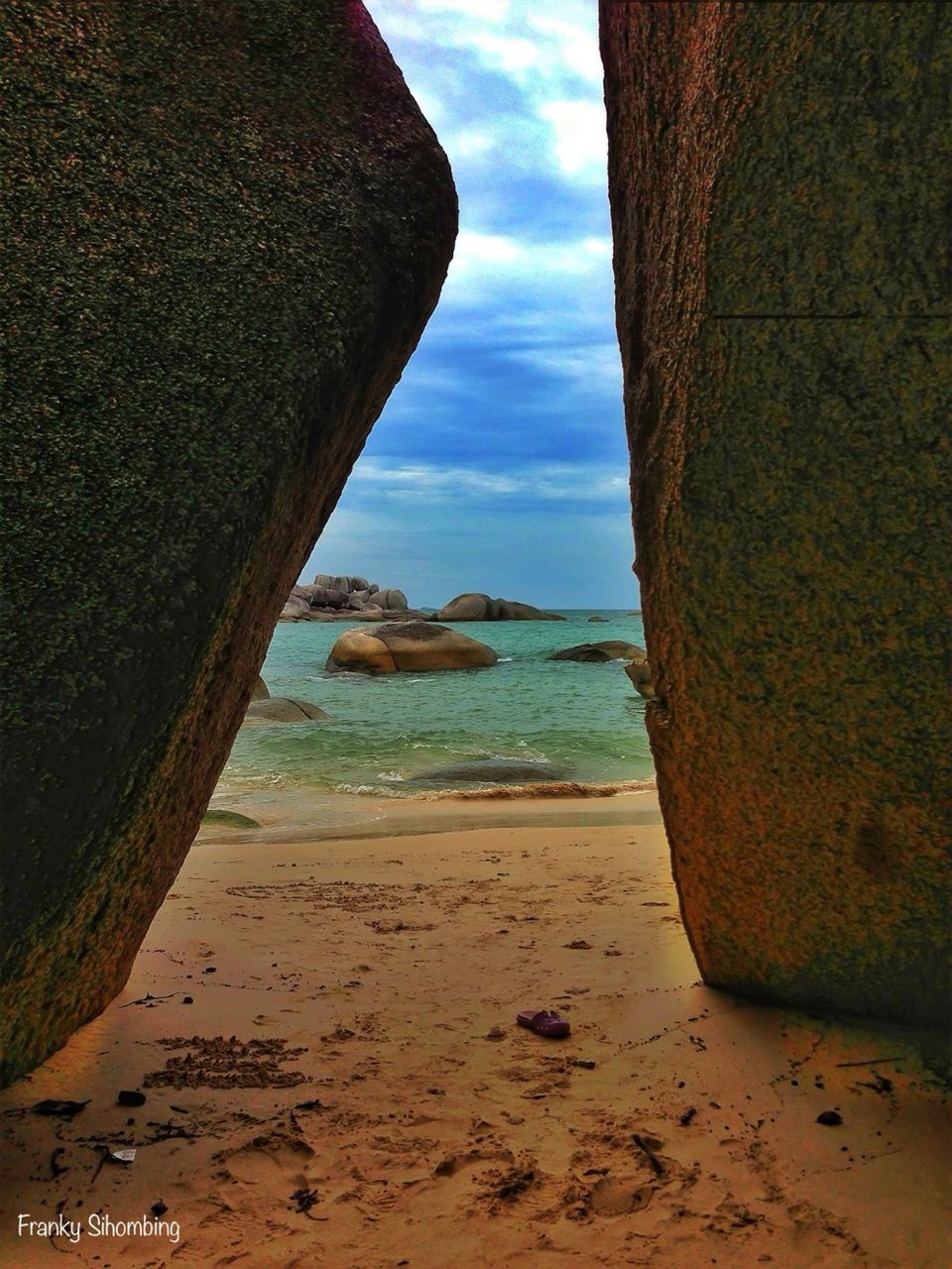 sea, beach, water, sky, horizon over water, shore, tranquil scene, tranquility, sand, scenics, beauty in nature, cloud - sky, nature, cloud, coastline, idyllic, built structure, calm, outdoors, no people