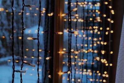 Close-up of illuminated lights at night