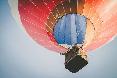 Low angle view of hot air balloon against clear sky