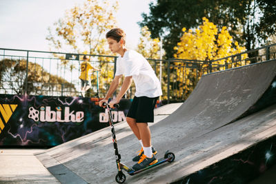 Full length of man skateboarding on skateboard