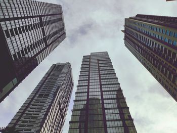 Low angle view of modern buildings against sky