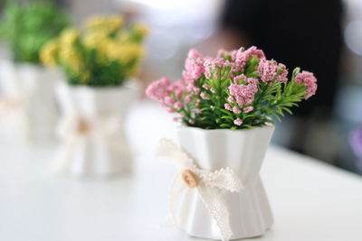 Close-up of flower vase on table