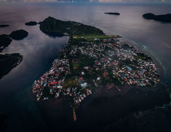 High angle view of illuminated cityscape at night