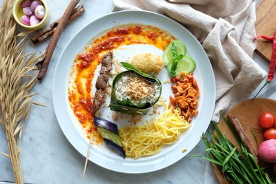 High angle view of breakfast served on table