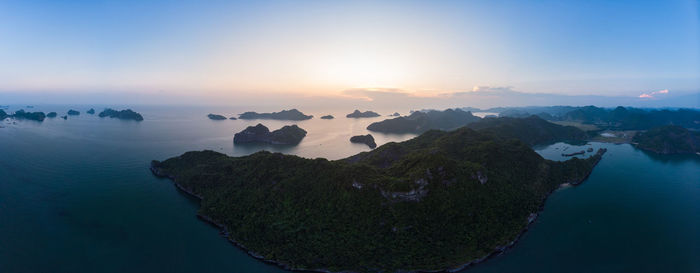 Panoramic view of sea against sky during sunset