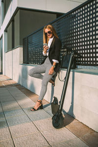 Full length portrait of young woman