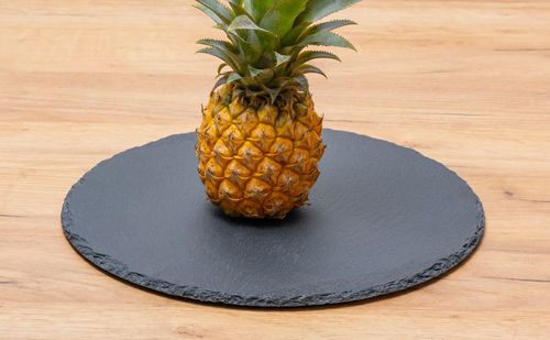 Close-up of pineapple on table