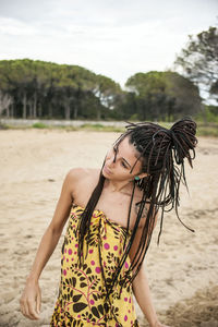 Woman standing at beach