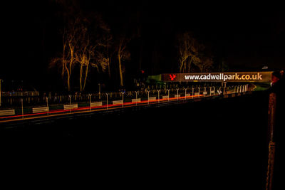 Light trails on road in city at night