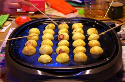 Close-up of person preparing food