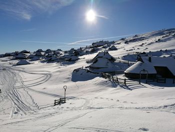 Scenic view of snow covered mountain against sky