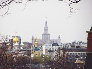 View of cathedral in city against clear sky