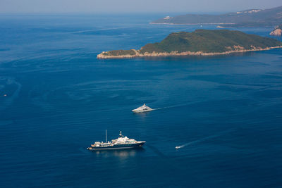 High angle view of sailboat sailing on sea