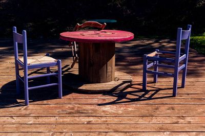 Empty chairs and table by tables