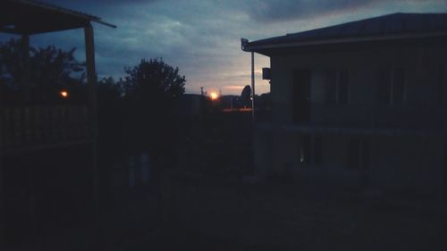 Silhouette of building at sunset