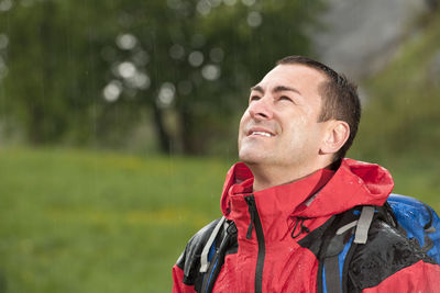 Man hiking in the rain in england