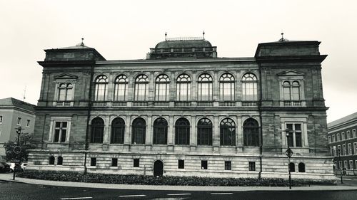 Facade of historic building against sky