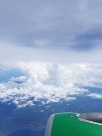 Scenic view of landscape against cloudy sky