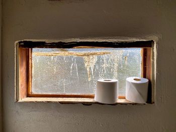 Open window on wall of old building