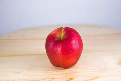 Close-up of apple on table