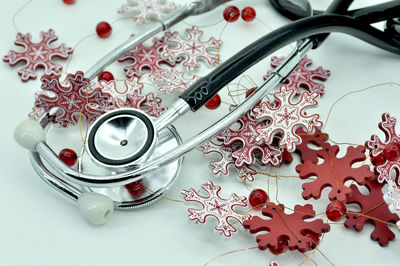High angle view of stethoscope on table
