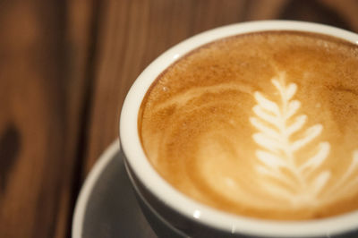 Close-up of cappuccino on table