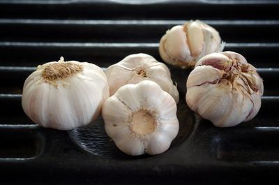 Close-up of garlic on table